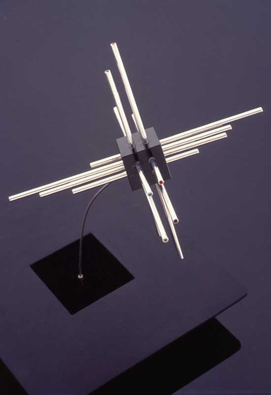 Submission by Eddie Sakamoto for the 1996 cube American Jewelry Design Council Project