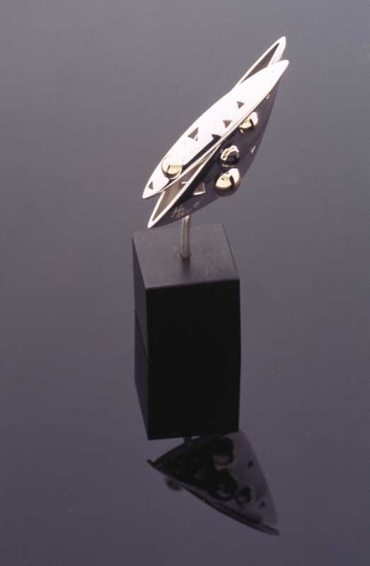 Submission by John Atencio for the 1996 cube American Jewelry Design Council Project