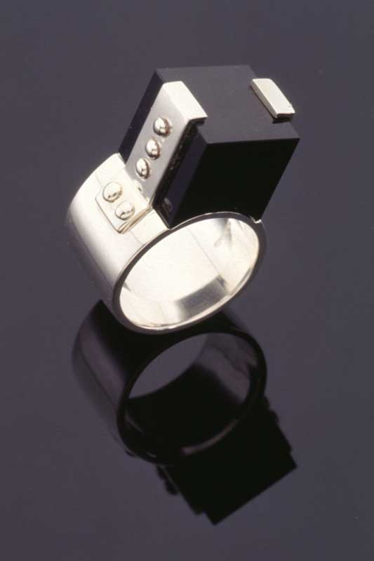 Submission by Jose Hess for the 1996 cube American Jewelry Design Council Project