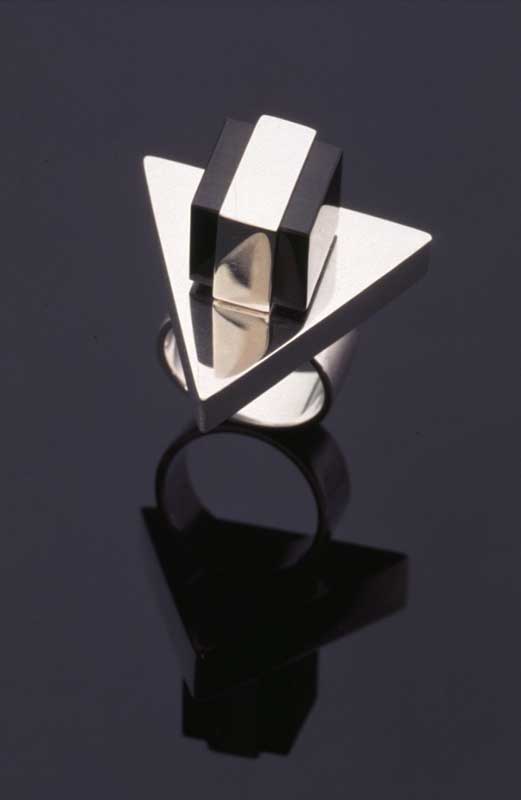 Submission by Sandy Baker for the 1996 cube American Jewelry Design Council Project