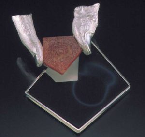 Submission by Susan Helmich for the 1999 puzzle American Jewelry Design Council Project