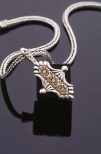 Submission by William Schraft for the 1996 cube American Jewelry Design Council Project