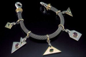 Submission by William Schraft for the 1999 puzzle American Jewelry Design Council Project
