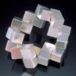 Submission by Alan Revere for the 1999 puzzle American Jewelry Design Council Project