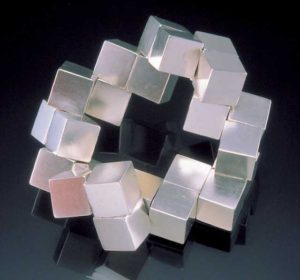 Submission by Alan Revere for the 1999 puzzle American Jewelry Design Council Project