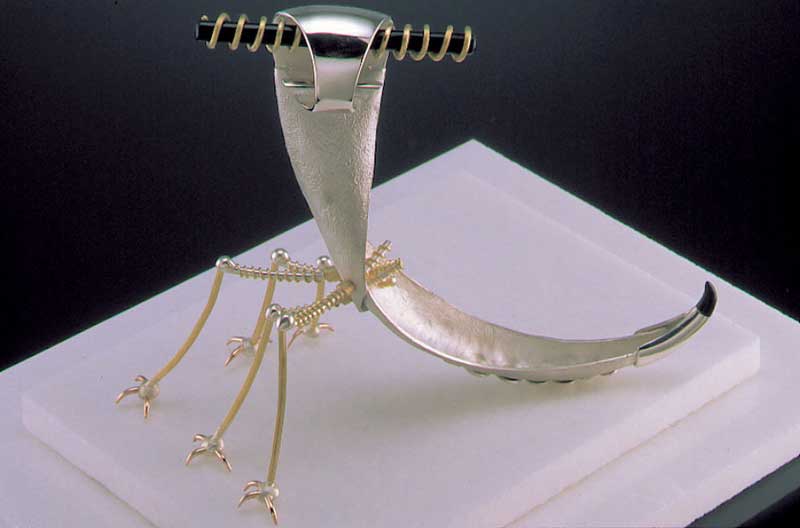 Submission by Alishan Halebian for the 1999 puzzle American Jewelry Design Council Project