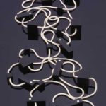 Submission by Chris Correia for the 1996 cube American Jewelry Design Council Project