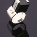 Submission by Jose Hess for the 1996 cube American Jewelry Design Council Project
