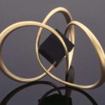 Submission by Michael Good for the 1996 cube American Jewelry Design Council Project