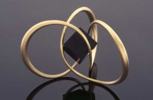 Submission by Michael Good for the 1996 cube American Jewelry Design Council Project