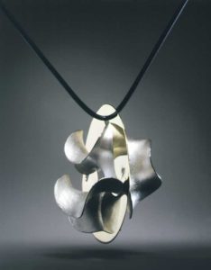 Submission by Michael Good for the 1998 key American Jewelry Design Council Project