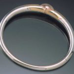 Submission by Pascal Lacroix for the 1999 puzzle American Jewelry Design Council Project