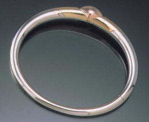 Submission by Pascal Lacroix for the 1999 puzzle American Jewelry Design Council Project
