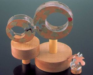 Submission by Paul Robilotti for the 1999 puzzle American Jewelry Design Council Project