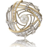 Submission by Ron Hartgrove for the 2009 explosion American Jewelry Design Council Project